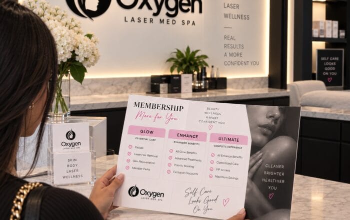 Client reviewing the Glow, Enhance, and Ultimate membership tiers at Oxygen Med Spa in Orland Park